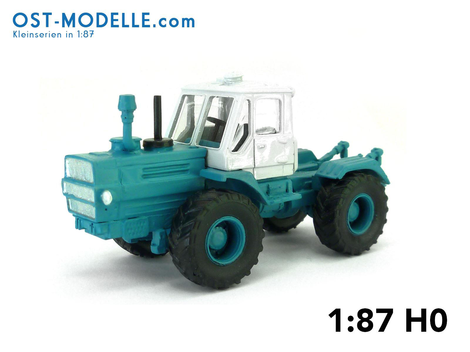 Traktor T150-K turkisblau weiß